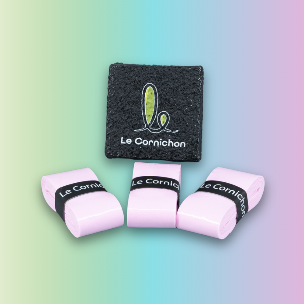 Pink overgrips and black paddle eraser